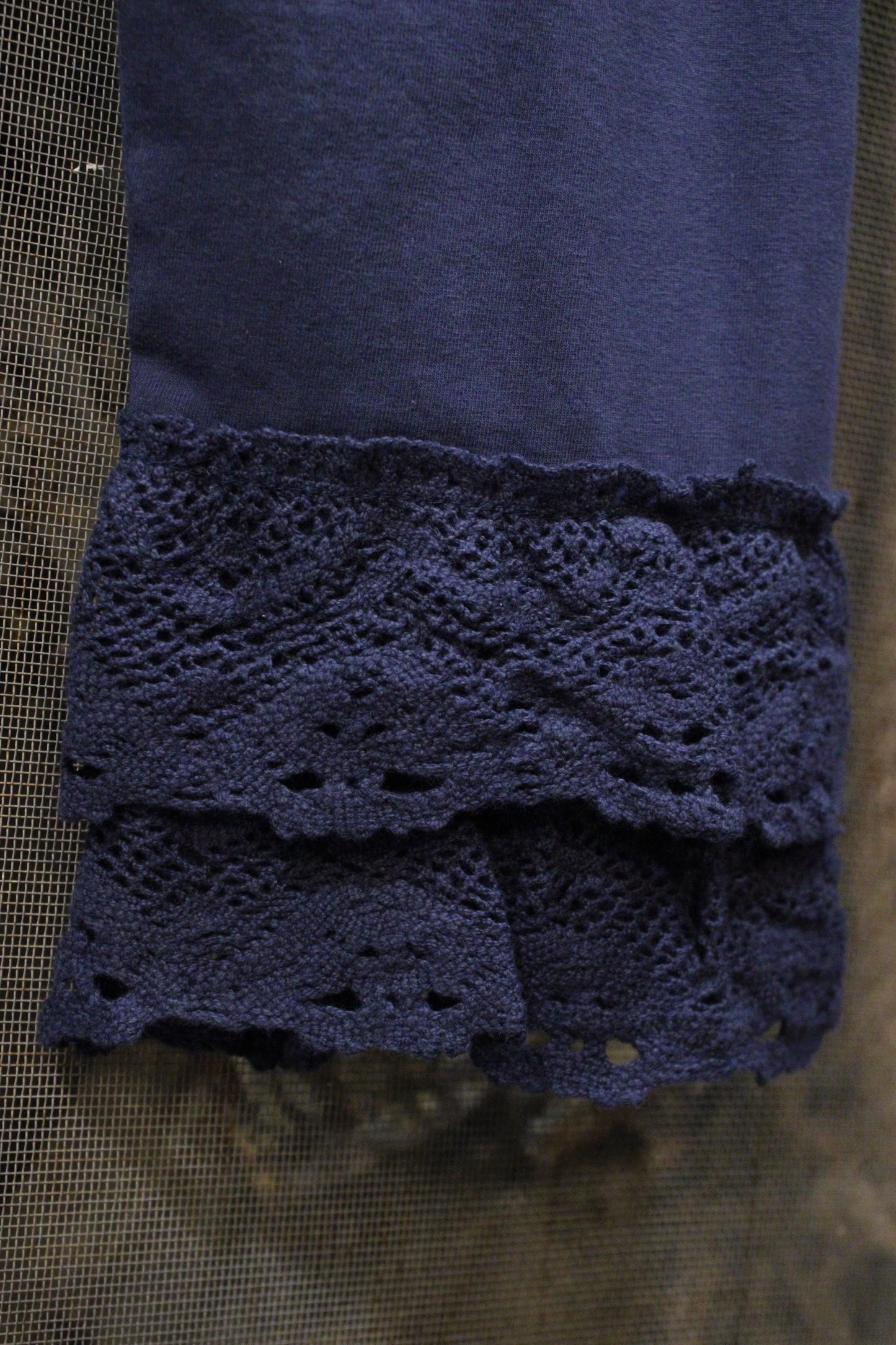 Happy Hem Navy Leggings by April Cornell