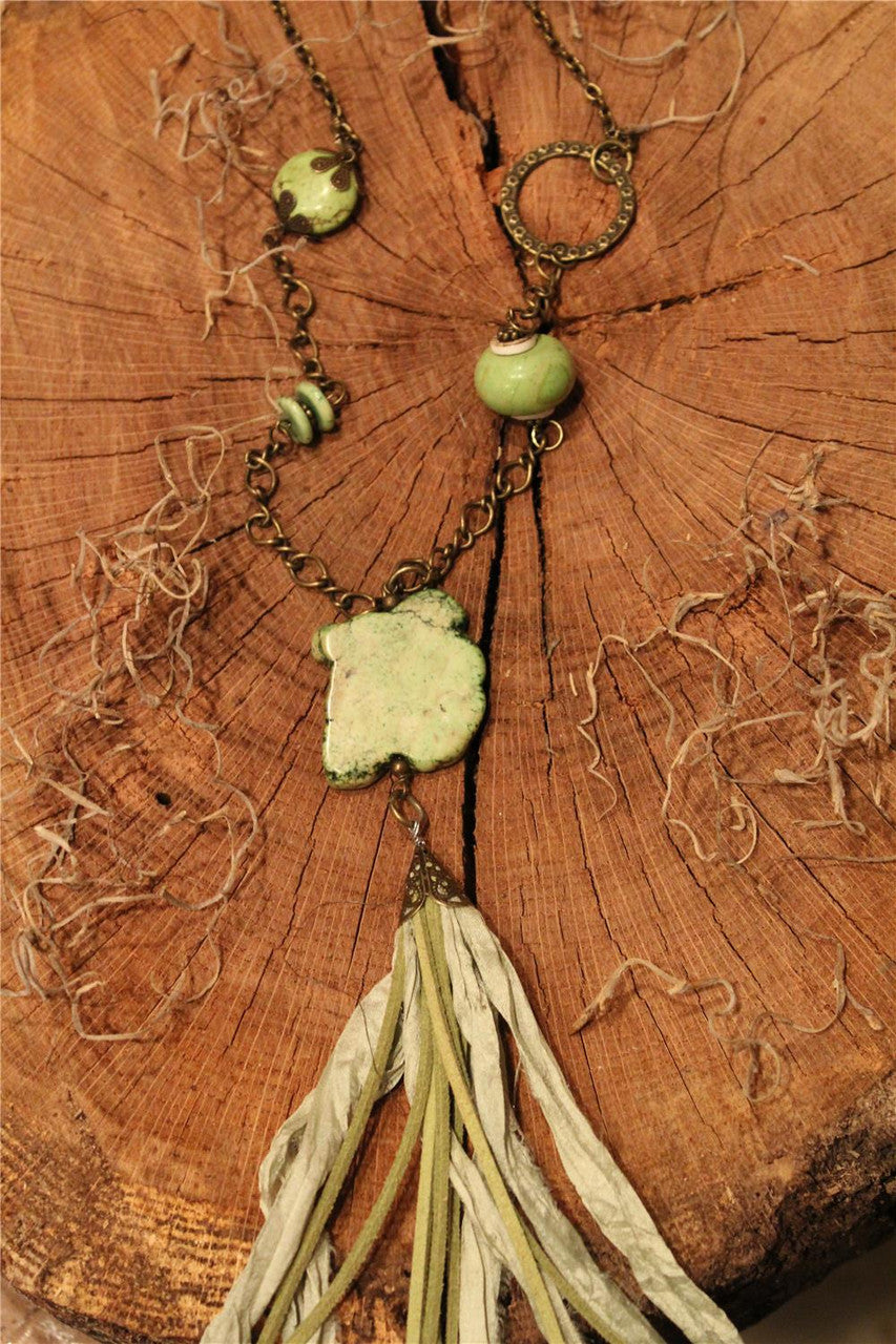 Marbled stone piece, sage marbled beads, turquoise irregular stone, sage leather and fabric tassel On bronze chain necklace