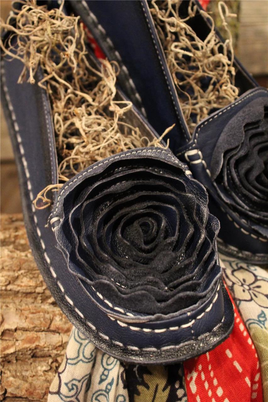 Navy leather loafer with flower rosette on toe