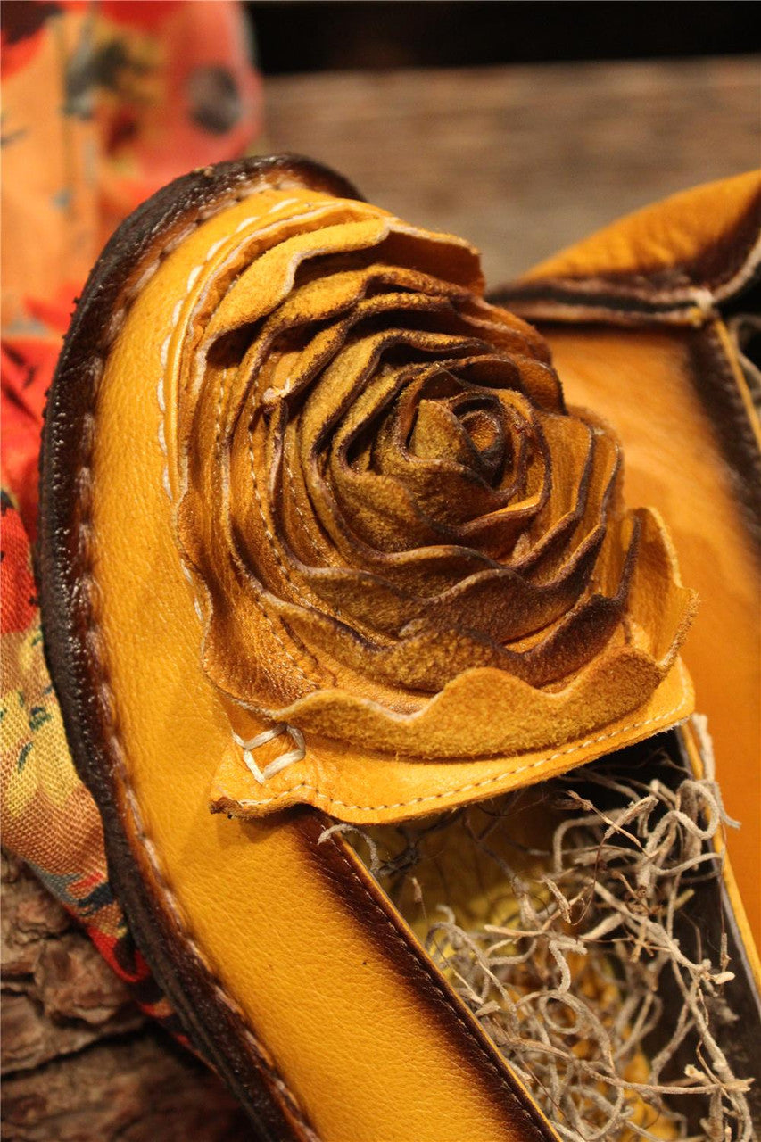 Mustard leather loafer with flower rosette on toe