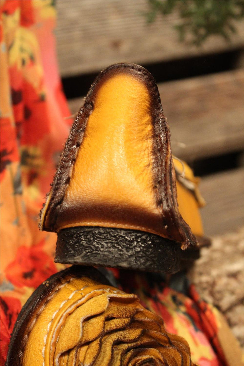 Mustard leather loafer with flower rosette on toe