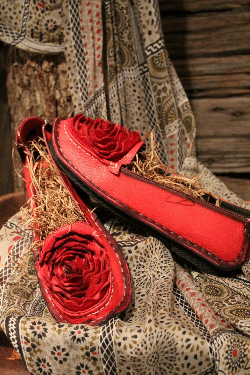 crimson red leather loafer with flower rosette on toe