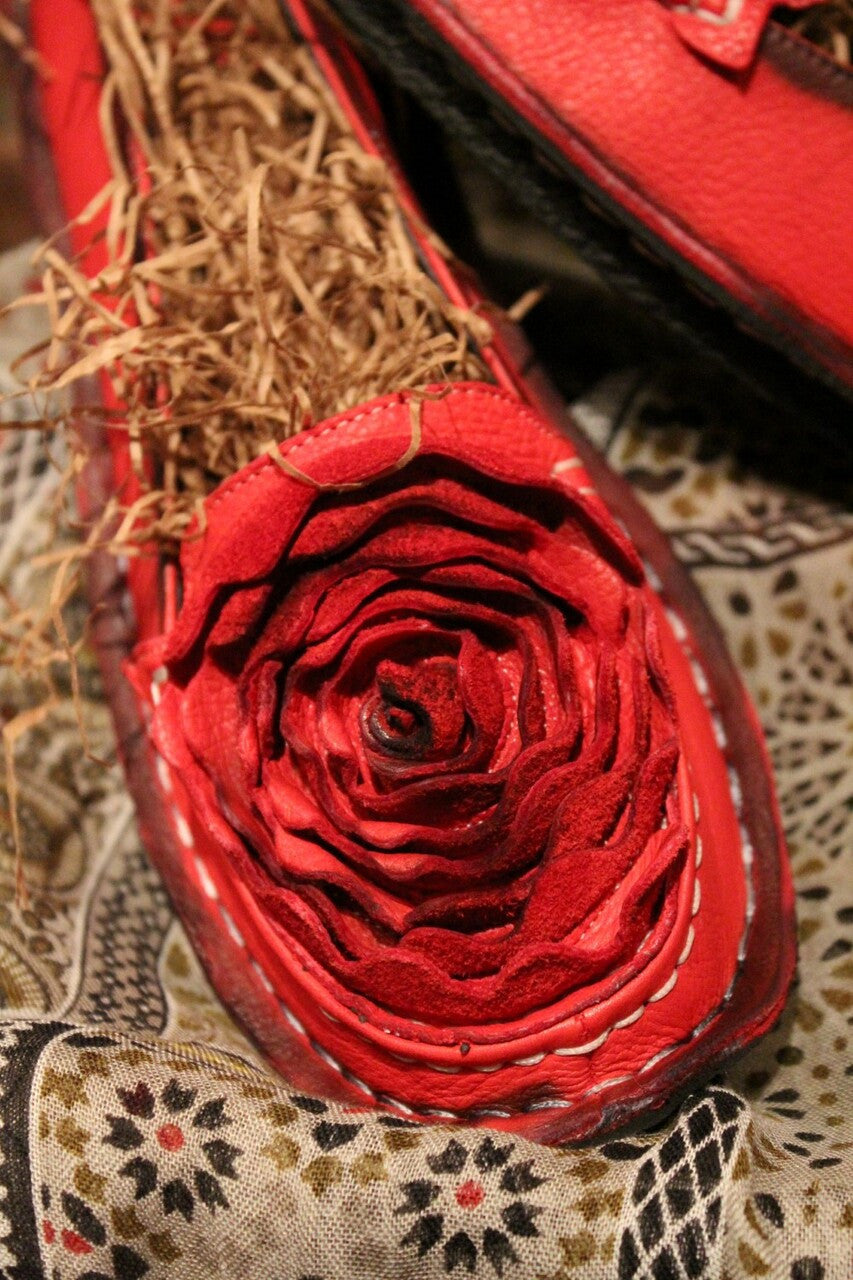 crimson red leather loafer with flower rosette on toe