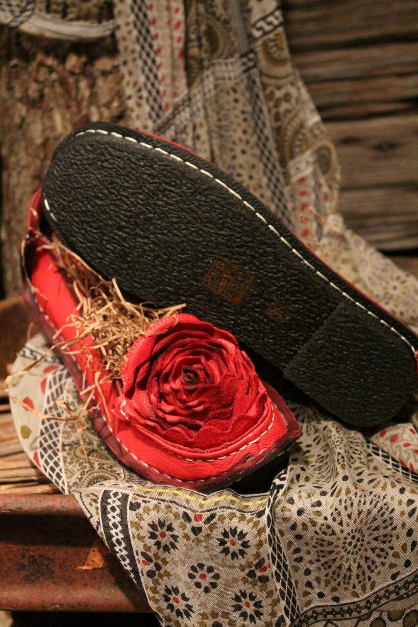 crimson red leather loafer with flower rosette on toe