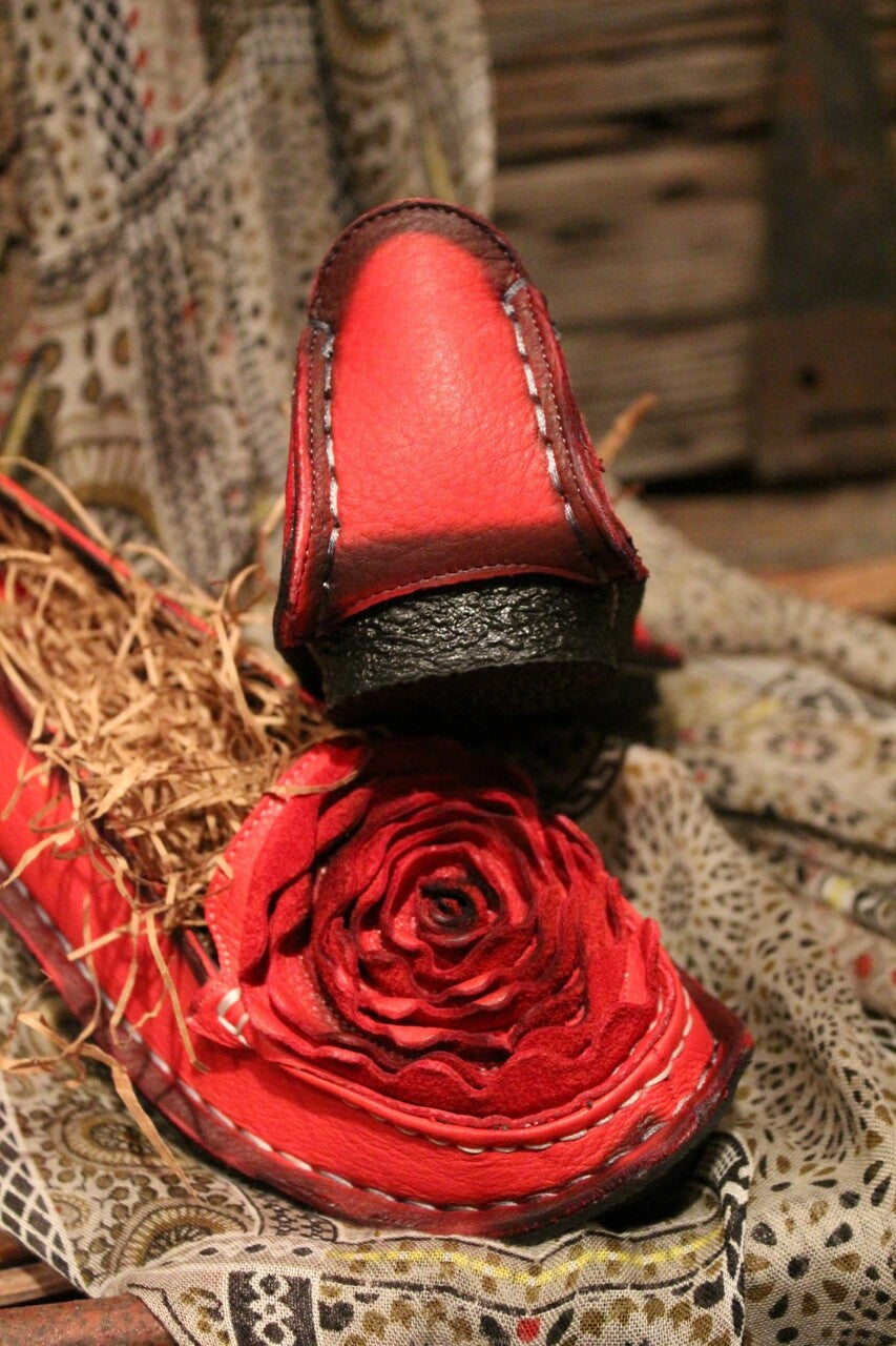 crimson red leather loafer with flower rosette on toe