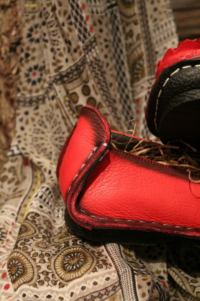 crimson red leather loafer with flower rosette on toe