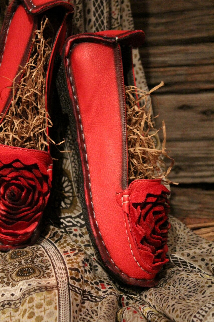 crimson red leather loafer with flower rosette on toe