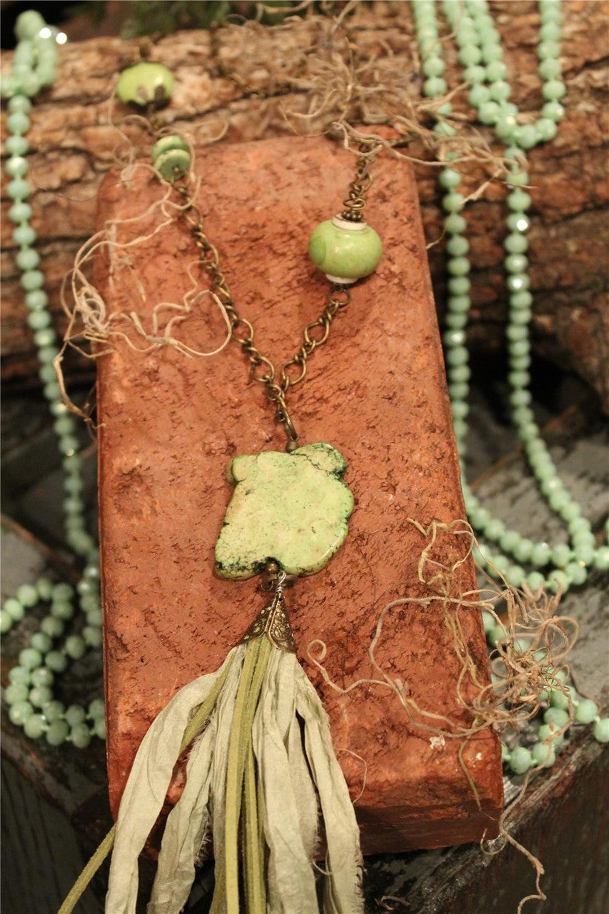 Marbled stone piece, sage marbled beads, turquoise irregular stone, sage leather and fabric   tassel On bronze chain necklace