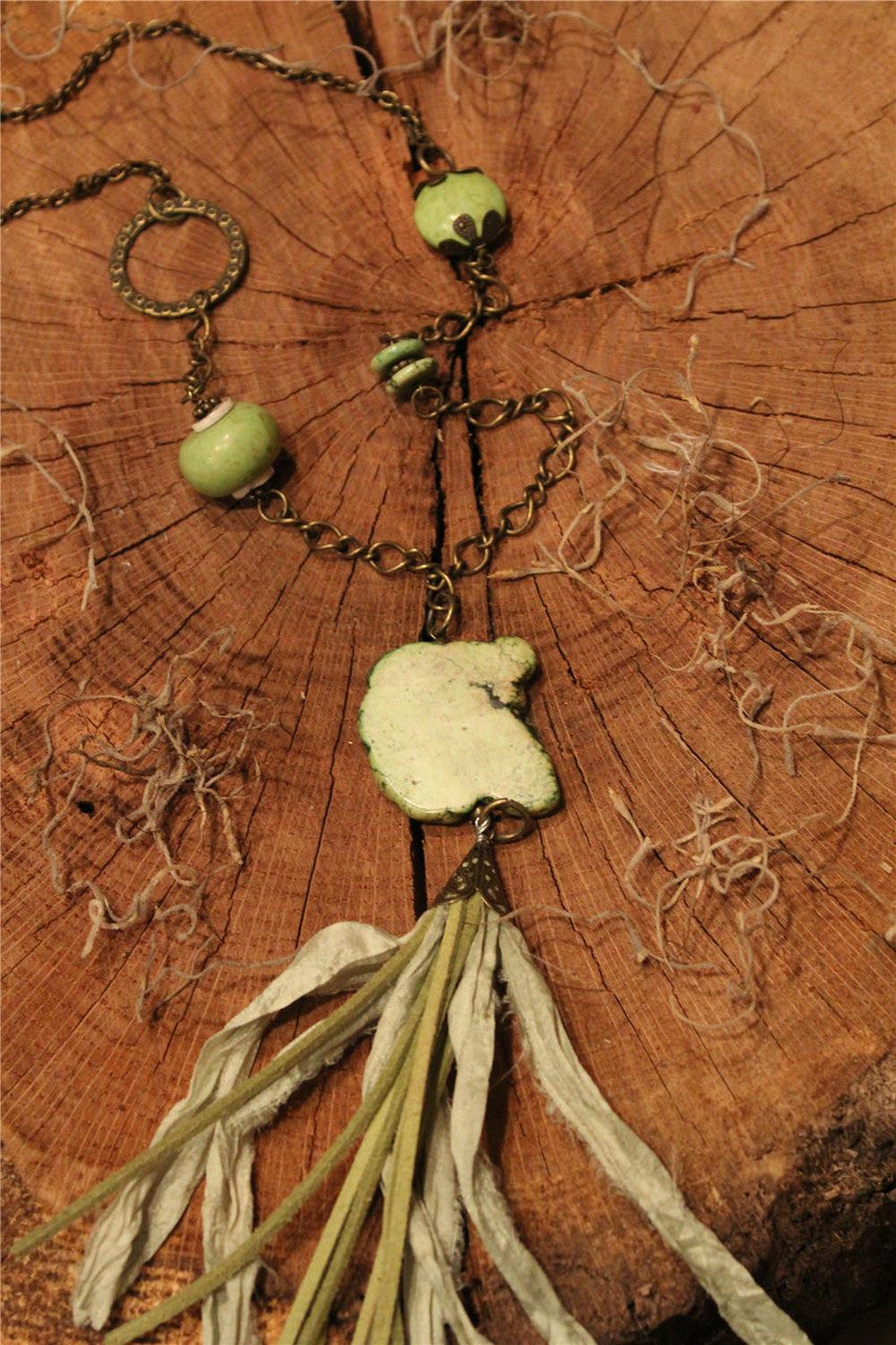 Marbled stone piece, sage marbled beads, turquoise irregular stone, sage leather and fabric   tassel On bronze chain necklace