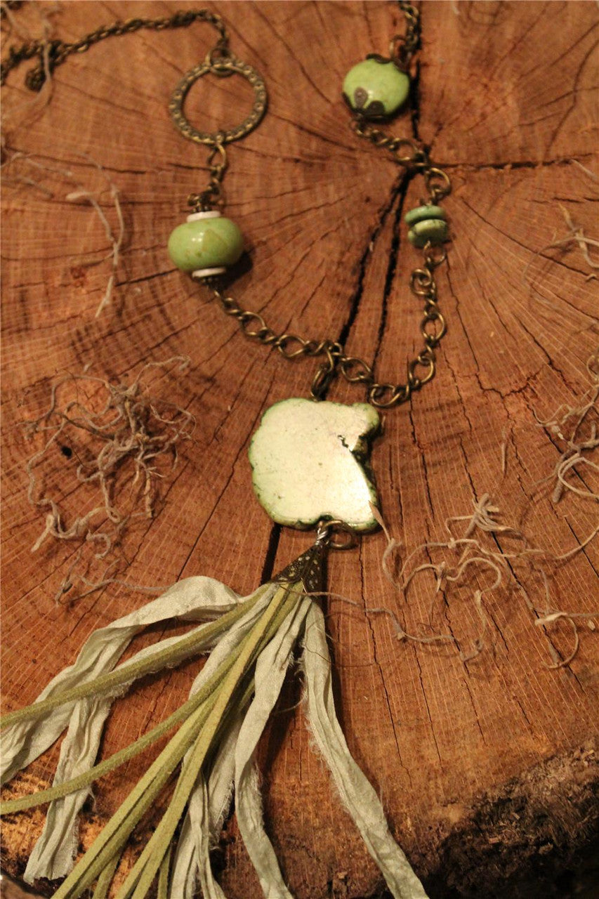 Marbled stone piece, sage marbled beads, turquoise irregular stone, sage leather and fabric   tassel On bronze chain necklace