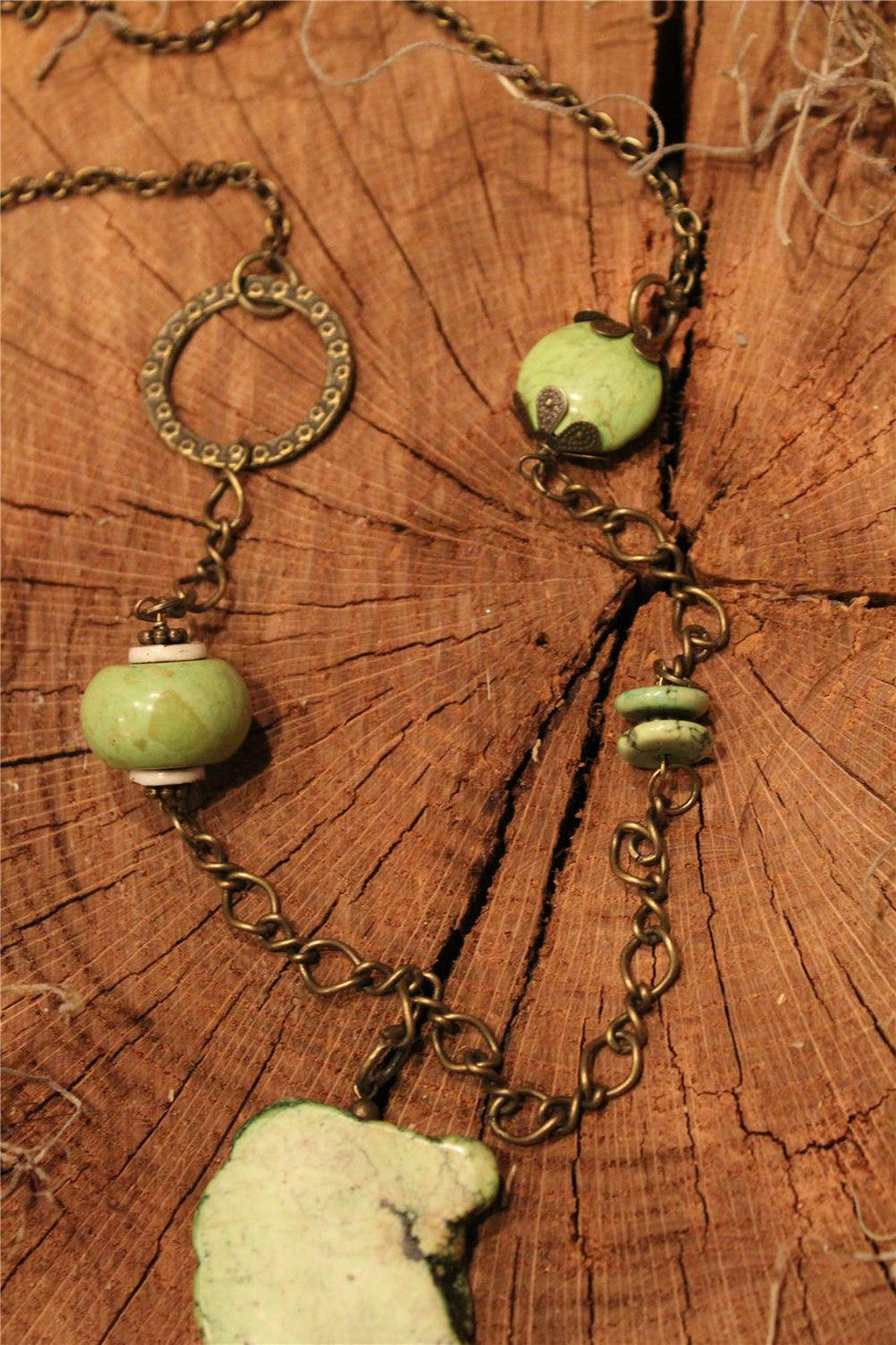Marbled stone piece, sage marbled beads, turquoise irregular stone, sage leather and fabric   tassel On bronze chain necklace