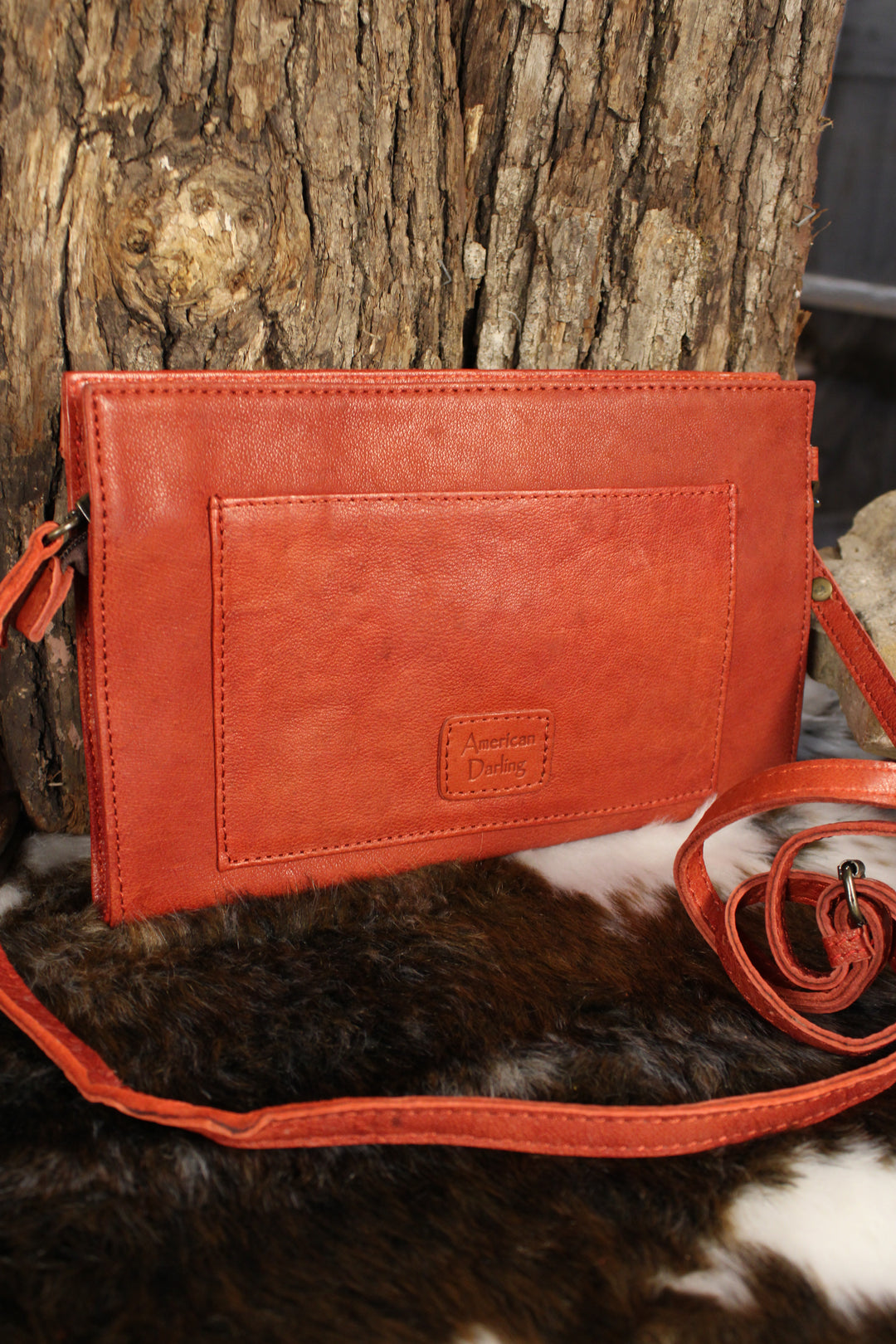 Crimson Canyon Leather Clutch