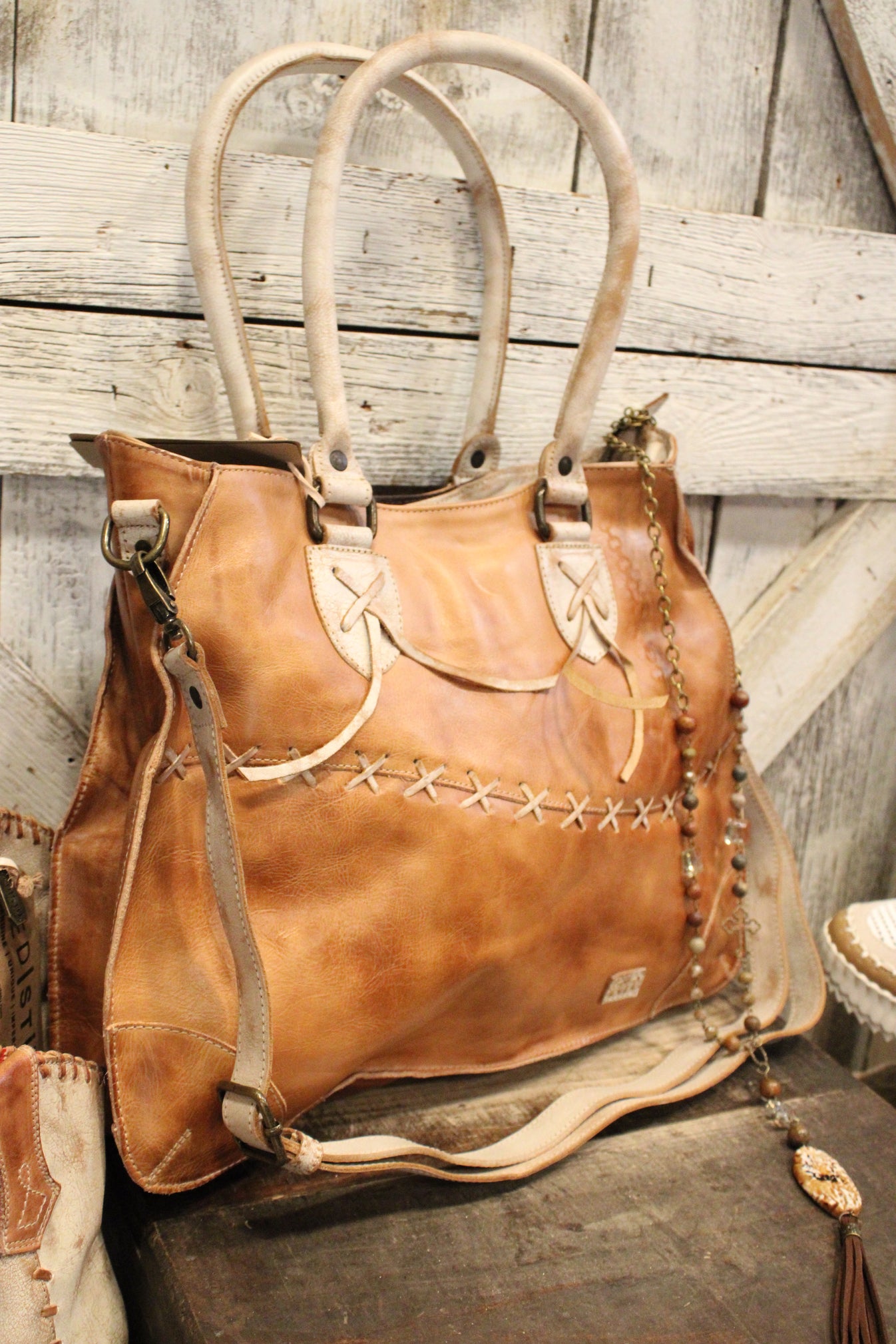 Image showcasing Bed|Stu Bruna Tan Rustic Nectar Lux Handbag - Farm Girls Fancy Frills