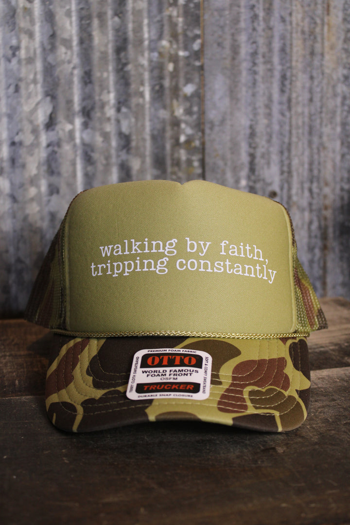 Walking By Faith Tripping Constantly Trucker Hat